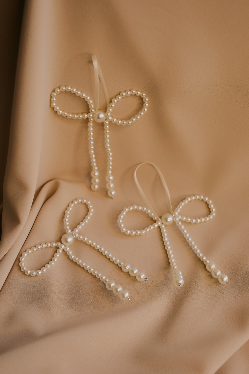 Pearl Whisper – handcrafted pearl ornament with silver details, gift‑ready by Rivolini.